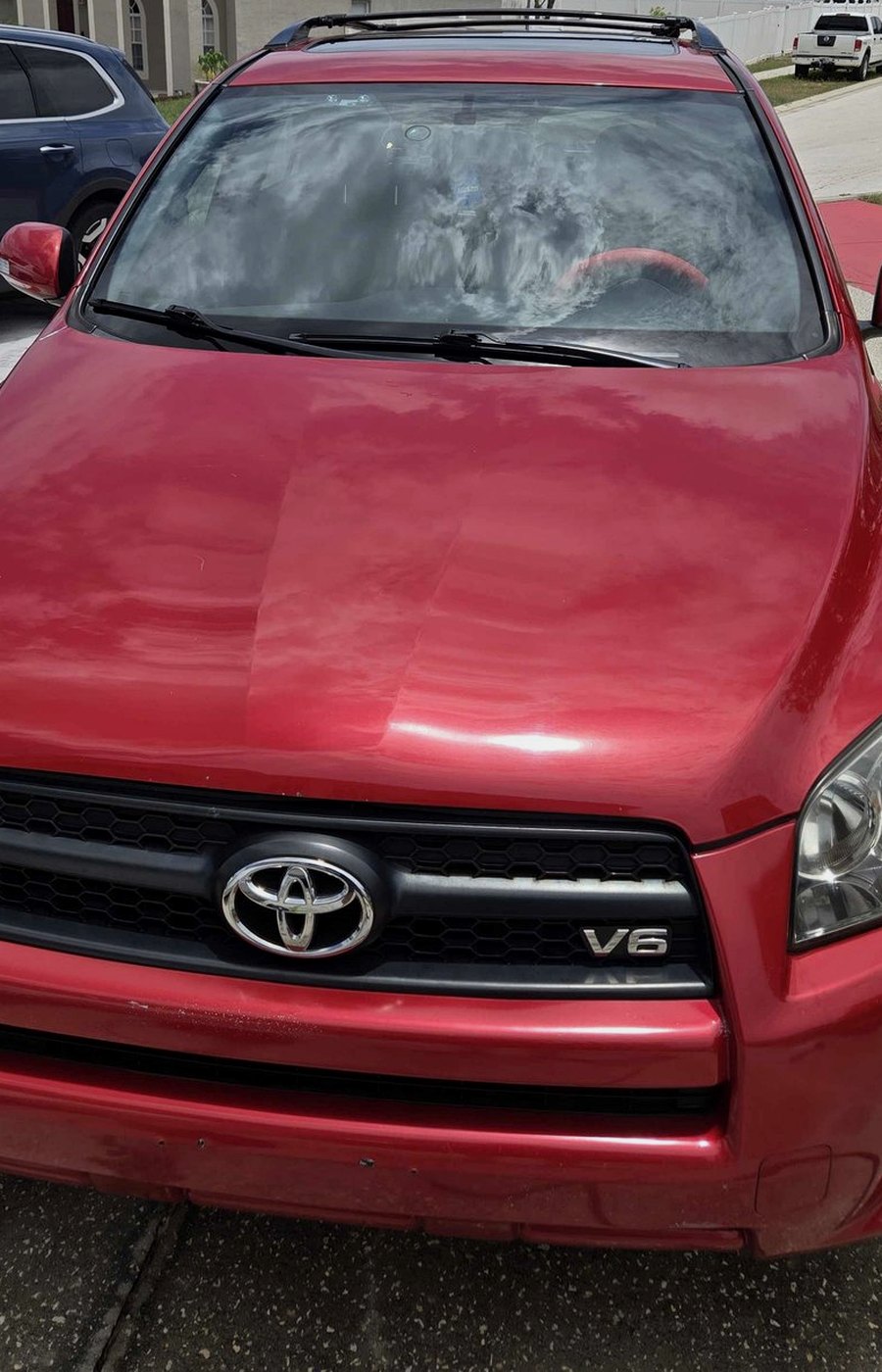 Red Toyota after an Exterior Refresh detail